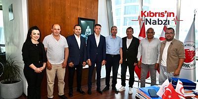 AMCAOĞLU, KTSYD HEYETİ İLE BİR ARAYA GELDİ